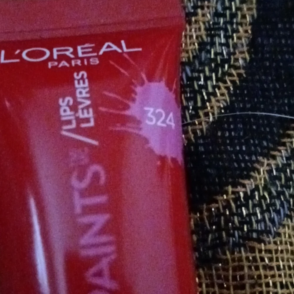 L'oréal lip gloss never worn nice color 3 items